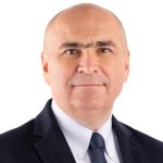 Ce invitație i-a făcut Bolojan lui Soros în urmă cu 8 ani: proiectul pe care ar fi vrut să pună mâna