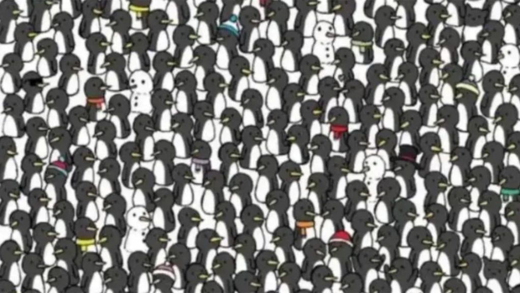 Două pisici s-au ascuns în mulțimea de pinguini. Numai cei cu atenție superumană le pot detecta în doar 10 secunde