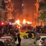 Zeci de indivizi mascați au atacat o secție de poliție. Huliganii au folosit cocktailuri Molotov, artificii și pietre