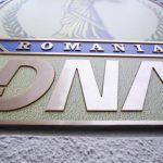 Polițist anticorupție prins în flagrant la Giurgiu. Ofițer de la Economic, reținut după ce a fost surprins primind mită 10.000 de lei în parcarea unui fast-food